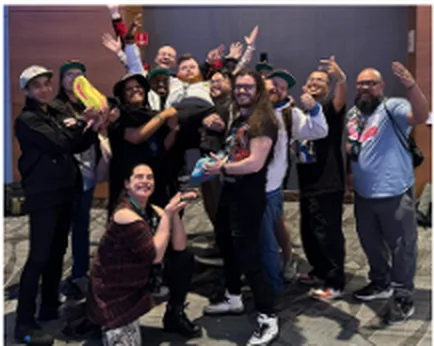 The Breakout team and community celebrating